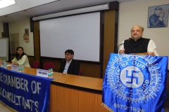 CA Hinesh Doshi (President) giving his opening remarks. Seen from L to R: CA Nishtha Pandya, Chairperson, Mr. Parag Thakkar, Principal, H. R. College